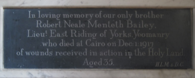 22. Wall tablet in memory of Robert Bailey, brother of Helen Lees-Milne.  He never lived in the village but his name is on the Great War  memorial tablet as she was his next-of-kin.
