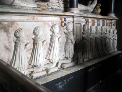 33. Carvings showing that Samuel and Mercy Sandys had 4 sons and 7 daughters.