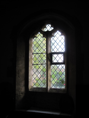 44. Decorated style clear glass window in the south wall of the chancel.