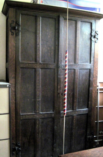 51. Cupboard in the vestry, made up from 16th century painted panels, probably from Ribbesfield House, near Bewdley.