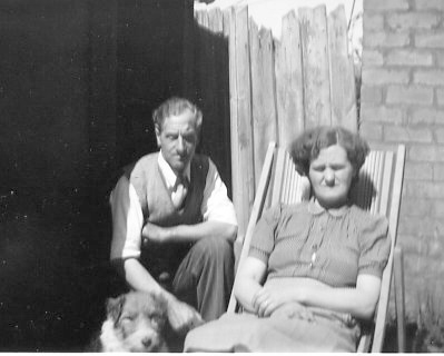 Rouben John (known as Jack) and Elisa Bennett and their dog,  in the garden at 48 Willersey Road