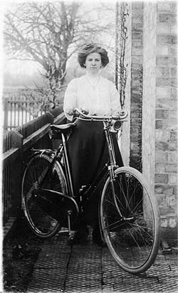 Miss Maud Byrd, with bike (note carbide lamp) (c 1906)