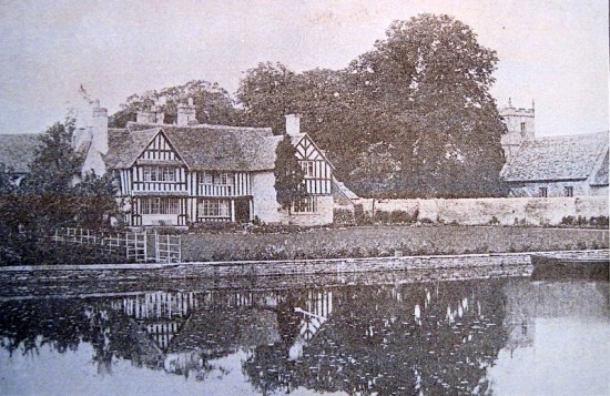 The East front of the Manor House in around 1901.  The wall separates the Manor grounds from the Church and until the 19th Century a stone barn stood in that vicinity.  Its stones may have been used to construct the wall.
