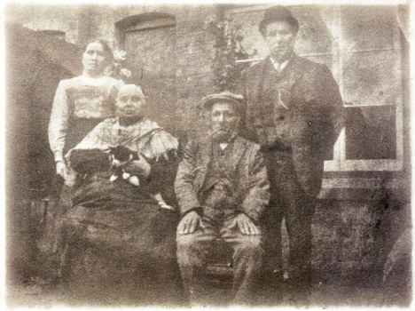 William and Emma Moore and, seated, the 'in laws' Charles and Comfort Colley who were living with the Moores in 1911.