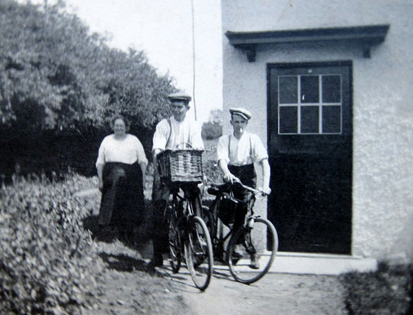 Mary Robbins with sons-in-law Horace Feeney and Fred Lambourn outside No 1 Council Houses. 