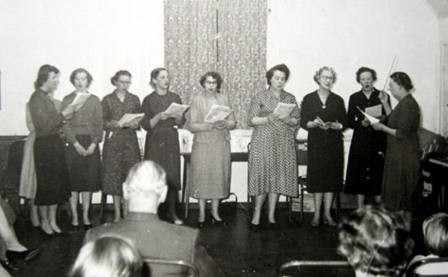 January 1959 – The W. I. Choir at Mr & Mrs Sturt's Golden Wedding Anniversary party.