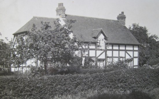 The brick and half-timbered cottage with a tiled roof that was later restyled and named ‘Robin Cottage’.