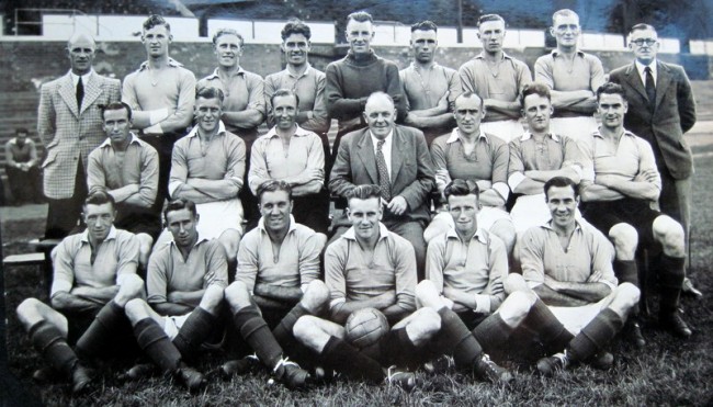 The Leicester City team in 1947-48.  Jack Haines is in the front row on the far right and the future England manager, Don Revie, is in the front row with the football.