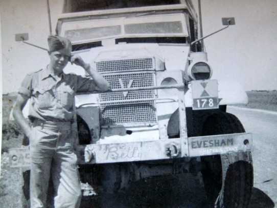 Harry in front of a truck named 'Evesham'